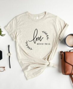 Love Never Fails T Shirt