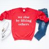 We Rise By Lifting Others Sweatshirt